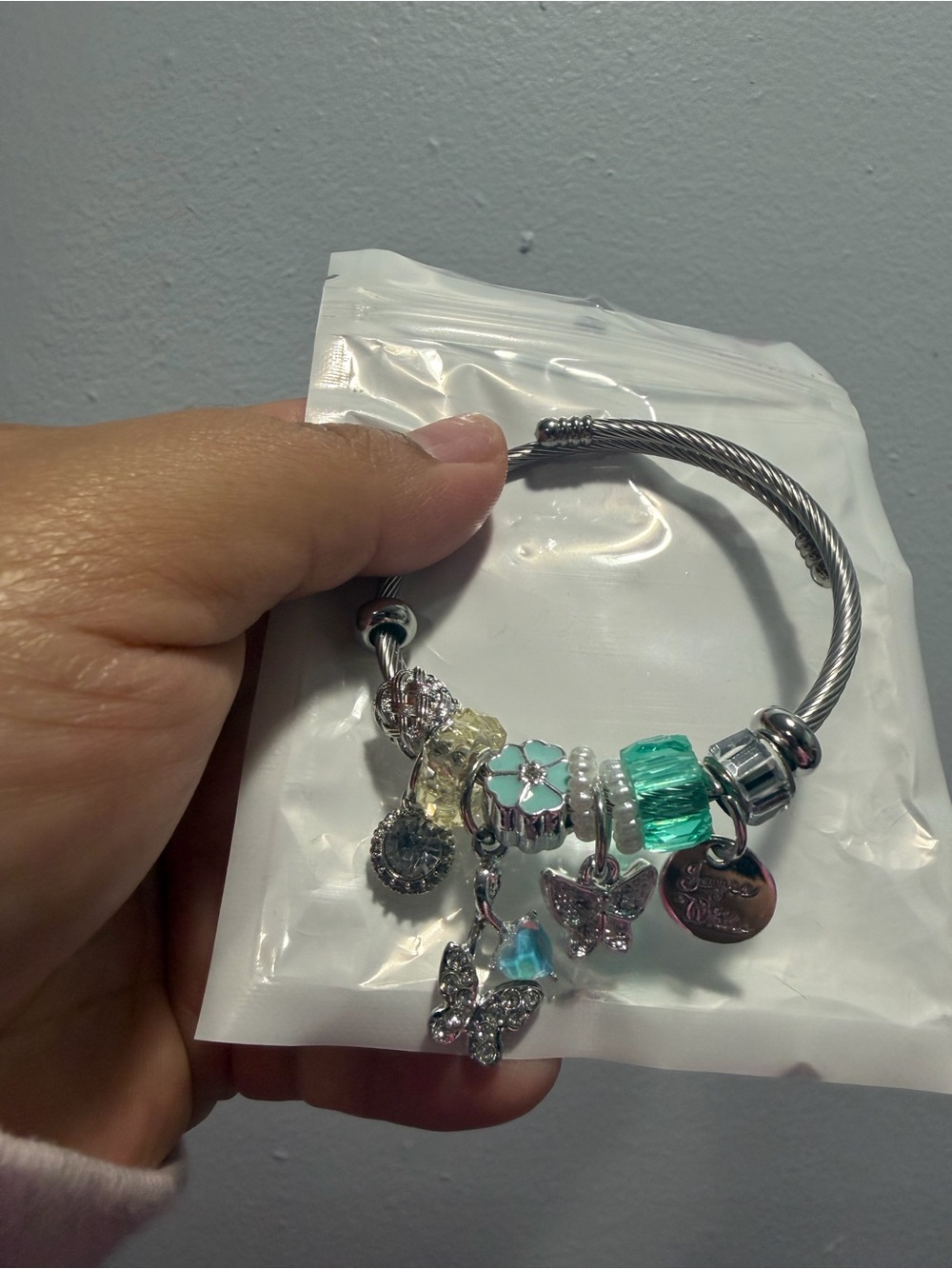Silver-tone Charm Bracelet with Turquoise and Clear Accents